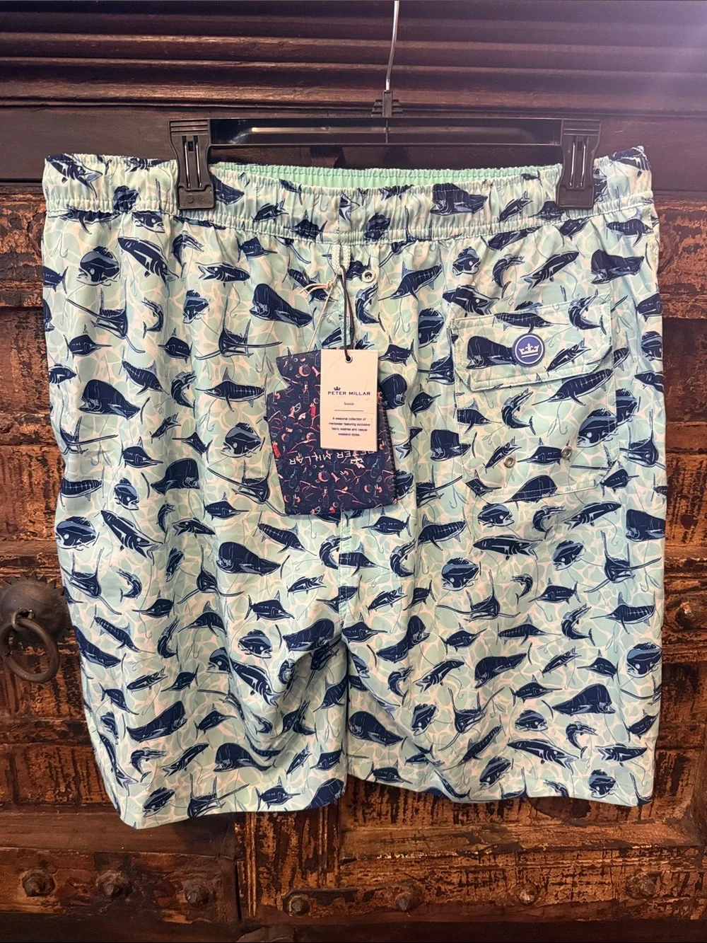 Peter Millar Light Blue Swim Trunks with Navy Fish Print